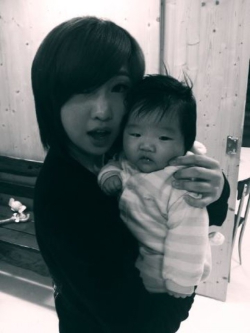 Minzy with a baby
